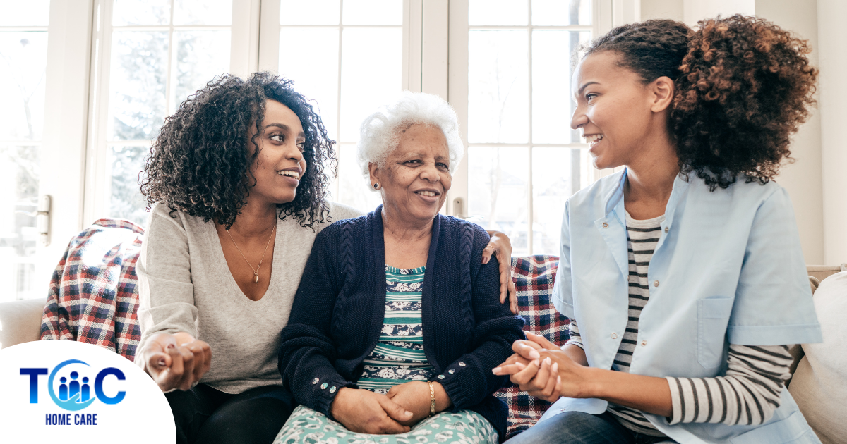 A professional explains senior care options to a woman and her aging mom.