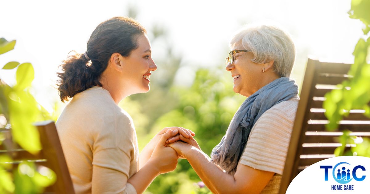 Caregiver provides at home senior services to an elderly loved one