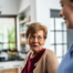 Caregiver provides attentive senior care as part of diabetes awareness