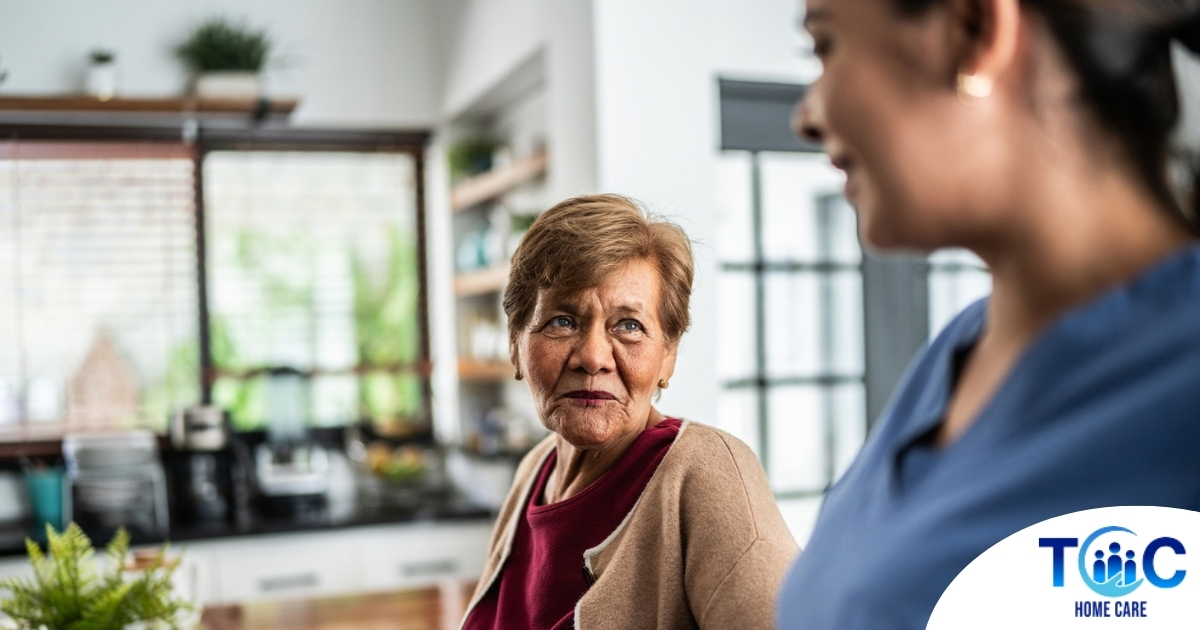 Caregiver provides attentive senior care as part of diabetes awareness